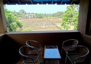 Covered sit-out facing the view